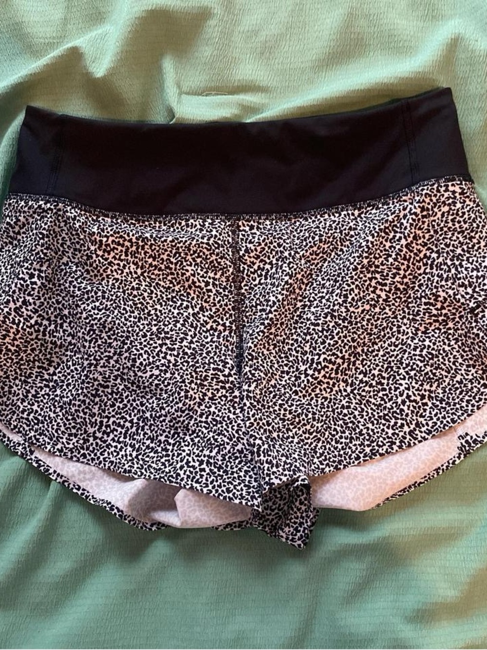 Athleta Black Waistband Running Shorts with Subtle Print
